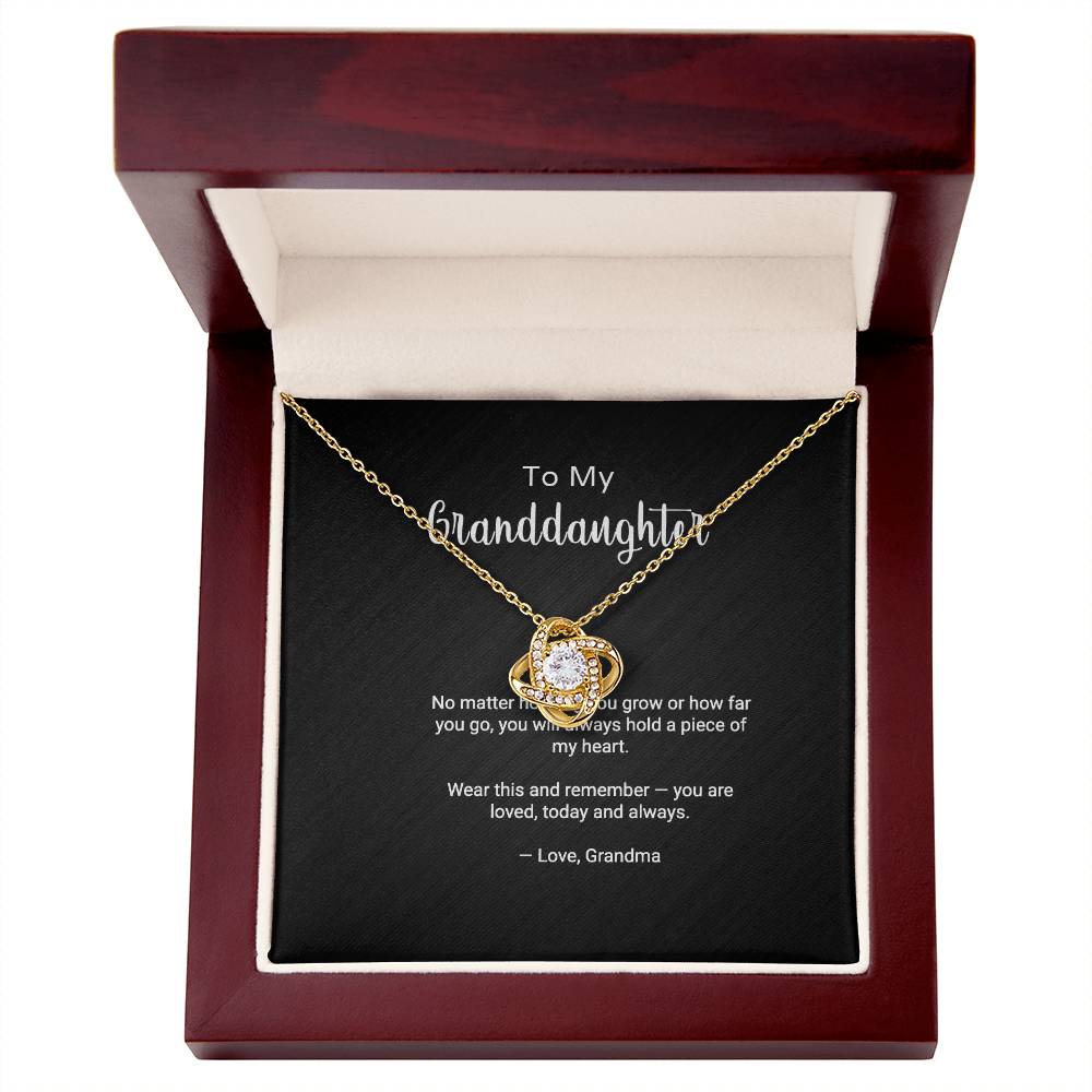 To My Granddaughter Love Knot necklace — gift presentation view