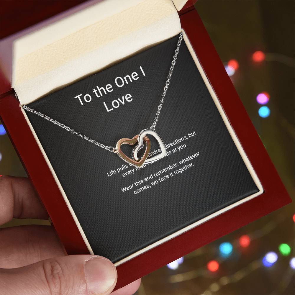 Interlocking Hearts couples necklace — gift presentation view