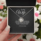 To My Wife Love Knot necklace with 'I'd Choose You Again' message card, held in hand in gift box